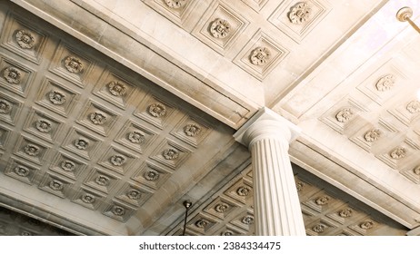 Low angle photograph of the ceiling of the Grand-Théâtre de Bordeaux would capture the exquisite details, craftsmanship, and architectural style of this iconic theater Designed by Victor Louis.