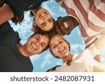 Low angle, portrait and group of happy friends together outdoor for bonding, solidarity and community. Face, below and team of people huddle for collaboration, support and smile for diversity on sky