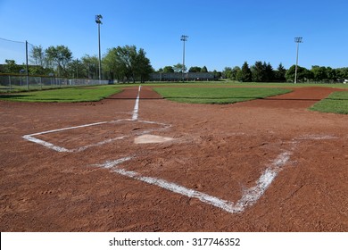 A low angle shot of a baseball field.

