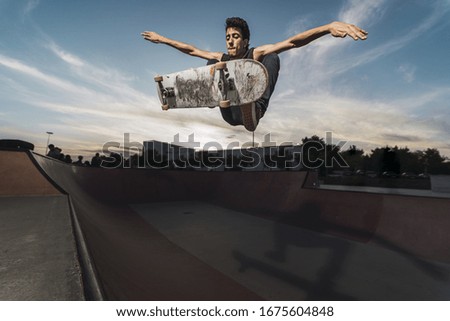 Similar – Beautiful young photographer sitting on the ground with the camera in the country