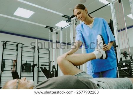 Similar – Image, Stock Photo A female trainer teaching a student how to do push-ups correctly.Outdoor sports in urban environment