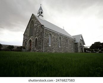 Low angle shot of former St John's Presbyterian church gothic architecture style facade building in Cromwell Central Otago South Island New Zealand - Powered by Shutterstock