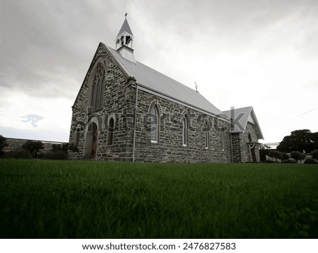 Low angle shot of former St John's Presbyterian church gothic architecture style facade building in Cromwell Central Otago South Island New Zealand