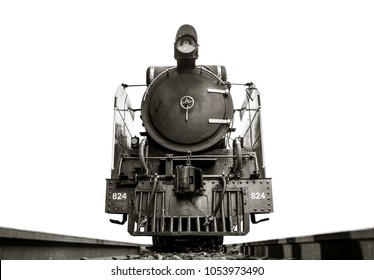 Low Angle Shot Front Of Image Black And White Retro Vintage Style Of Train Old Steam Locomotive Pacific On The Tracks From Thailand Isolated On White Background.