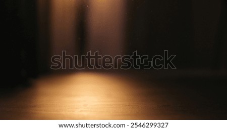 low angle shot of interior with sunset light and some dust floating in air
