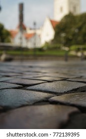 Low Angle Shot Of Wet Old Pavement In Tallinn