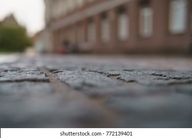 Low Angle Shot Of Wet Old Pavement In Tallinn