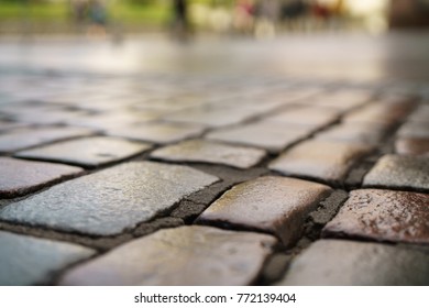 Low Angle Shot Of Wet Old Pavement In Tallinn