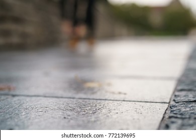 Low Angle Shot Of Wet Old Pavement In Tallinn