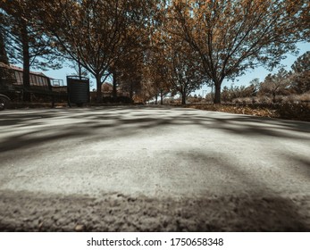 A Low Angle Of The Side Walk Around A Small Park Resting Area Around Summerlin. 