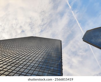 low angle skyscraper shoot with cloudy skies