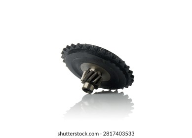 Low angle studio perspective view of engine oil pump drive gear featuring durable black plastic outer cogwheel and machined steel center pinion shaft, shot on reflective white background showcasing precision mechanical powertrain components for motorcycle repair.