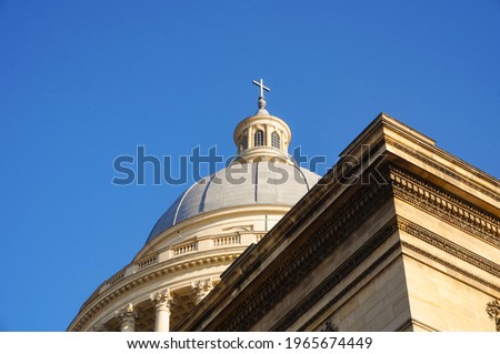 Low angle view of the 80-meter high dome of the neoclassical, 18th century Panthéon of Paris, in France, initially a church and now a mausoleum for prominent historical figures of the French Republic