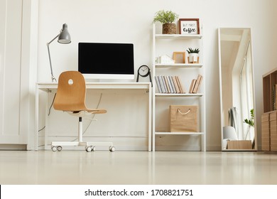 Low Angle View At All-white Modern Interior With Focus On Empty Home Office Workplace, Copy Space