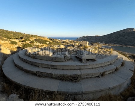Low angle view of ancient marble columns and architrave against deep blue sky at Knidos Ancient City, Datca, Turkey