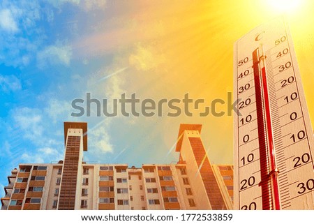 low angle view of apartment on sunny day of summer with high temperature overheat
