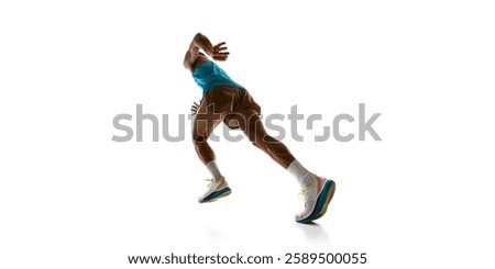 Low angle view of athlete pushing forward in race, body leaning into motion with precision and power against white studio background. Concept of sport, triathlon, action, and endurance training.