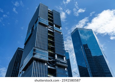 Low Angle View Of Building Against Blue Sky