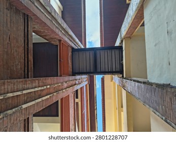 Low angle view of building corridor with connecting bridge