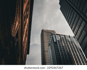low angle view of buildings set against cloudy sky