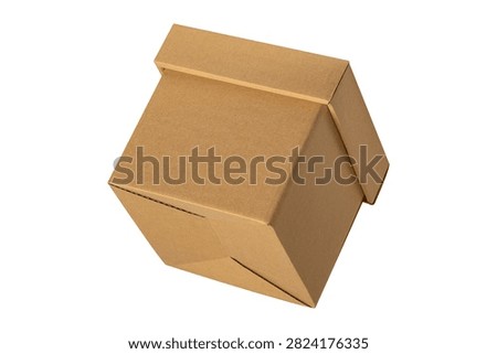 Low angle view of closed brown square cardboard box with lid isolated on a white background with copy space. Concept for parcel transportation, e-commerce and financial business.