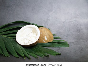 Low Angle View Of Coconut, Studio Shot Coconut Leaf And Coconut Meat