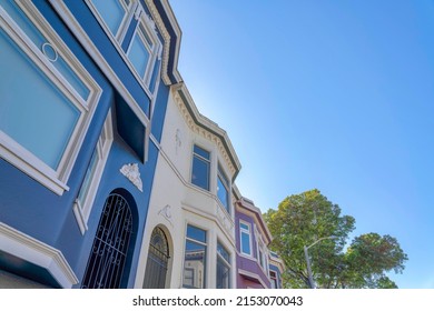 Low angle view of complex houses with arched iron door gate in San Francisco, California