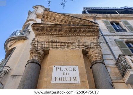 Low angle view of cryptoporticus of the roman forum showing intricate carvings and columns, Place du Forum, Arles, Provence Alpes Cote d'Azur, France