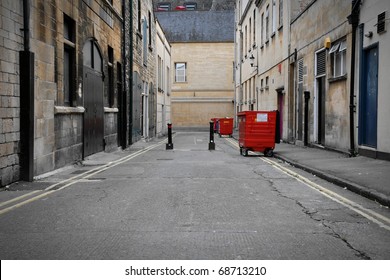 Low Angle View of a Dark Alley in an Inner City Area - Powered by Shutterstock