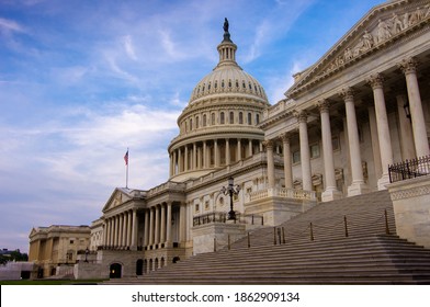 Low Angle View Of The East Entrance To United States Capitol Building In Washington DC With Marble Dome And Stairs