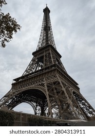 Low Angle View of the Eiffel Tower Against a Cloudy Sky in Paris, France