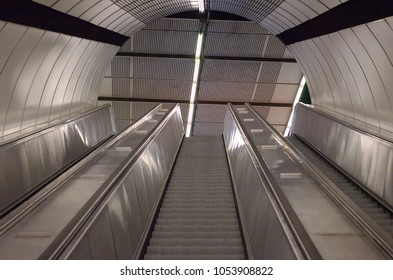 Low angle view of empty escalator at underground metro station