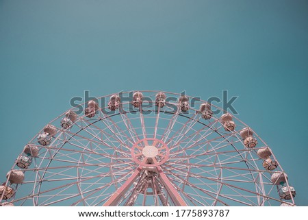 Low angle view of empty ferris wheel without people