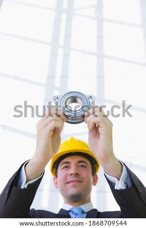 Similar – Image, Stock Photo Businessman holds both hands in front of his body