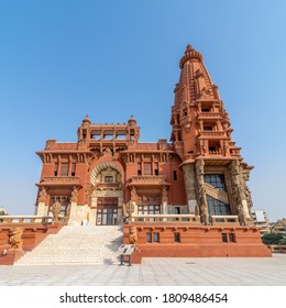 Low angle view of front facade of Baron Empain Palace, a historic mansion inspired by the Cambodian Hindu temple of Angkor Wat, located in Heliopolis district, Cairo, Egypt - Shutterstock ID 1809486454