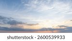 Low angle view and full frame of beautiful morning or evening blue and orange sky with cloudy while sunsets or sunrises was taken at the sea used as natural background texture	