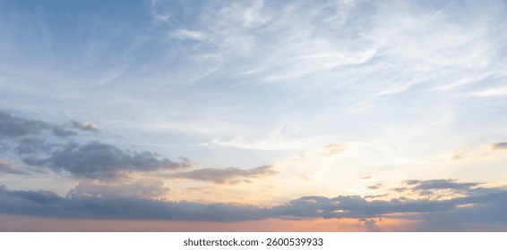 Low angle view and full frame of beautiful morning or evening blue and orange sky with cloudy while sunsets or sunrises was taken at the sea used as natural background texture	