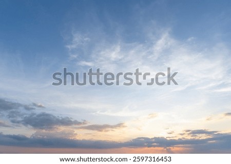 Low angle view and full frame of beautiful morning or evening blue and orange sky with cloudy while sunsets or sunrises was taken at the sea used as natural background texture