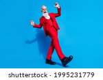 Low angle view full size photo of aged rich man happy positive smile dancer music isolated over blue color background