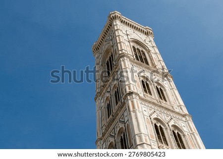 Low angle view of Giotto's bell tower on the cathedral Santa Maria del Fiore in Firenze