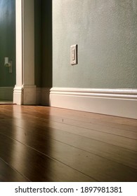 Low Angle View Of Hardwood Floor With Dust 