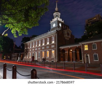 Low Angle View Of Illuminated Independence Hall With Light Trails From Cars Driving By, Late Night Philly