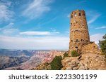 Low Angle View Of Indian Watchtower At Desert View At Grand Canyon National Park and cloudy Blue Sky In Arizona