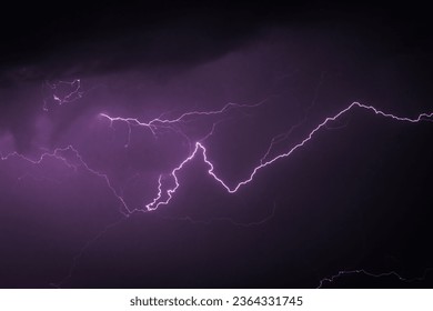 Low angle view of lightning in sky at night