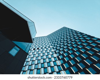 Low angle view of modern building against the sky  - Powered by Shutterstock