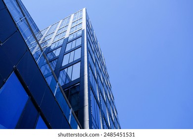 Low angle view of a modern building against the sky  - Powered by Shutterstock