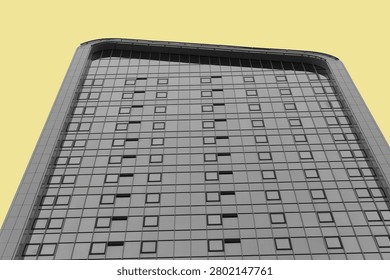 Low angle view of a modern high rise building facade against a plain background. Repeating windows and geometric lines create an urban architecture pattern. Suitable for real estate, business, and