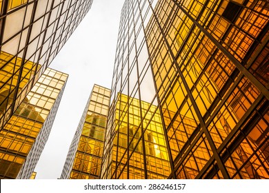 Low Angle View Of Modern Skyscraper Exterior And Sky In Modern City