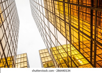 Low Angle View Of Modern Skyscraper Exterior And Sky In Modern City