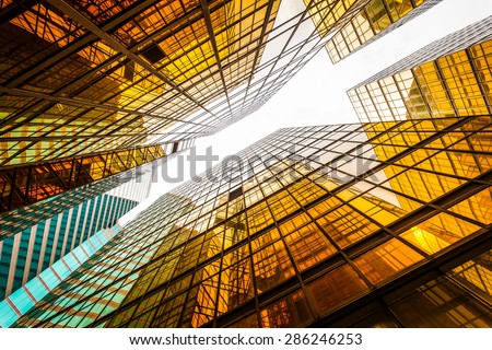 low angle view of modern skyscraper exterior and sky in modern city